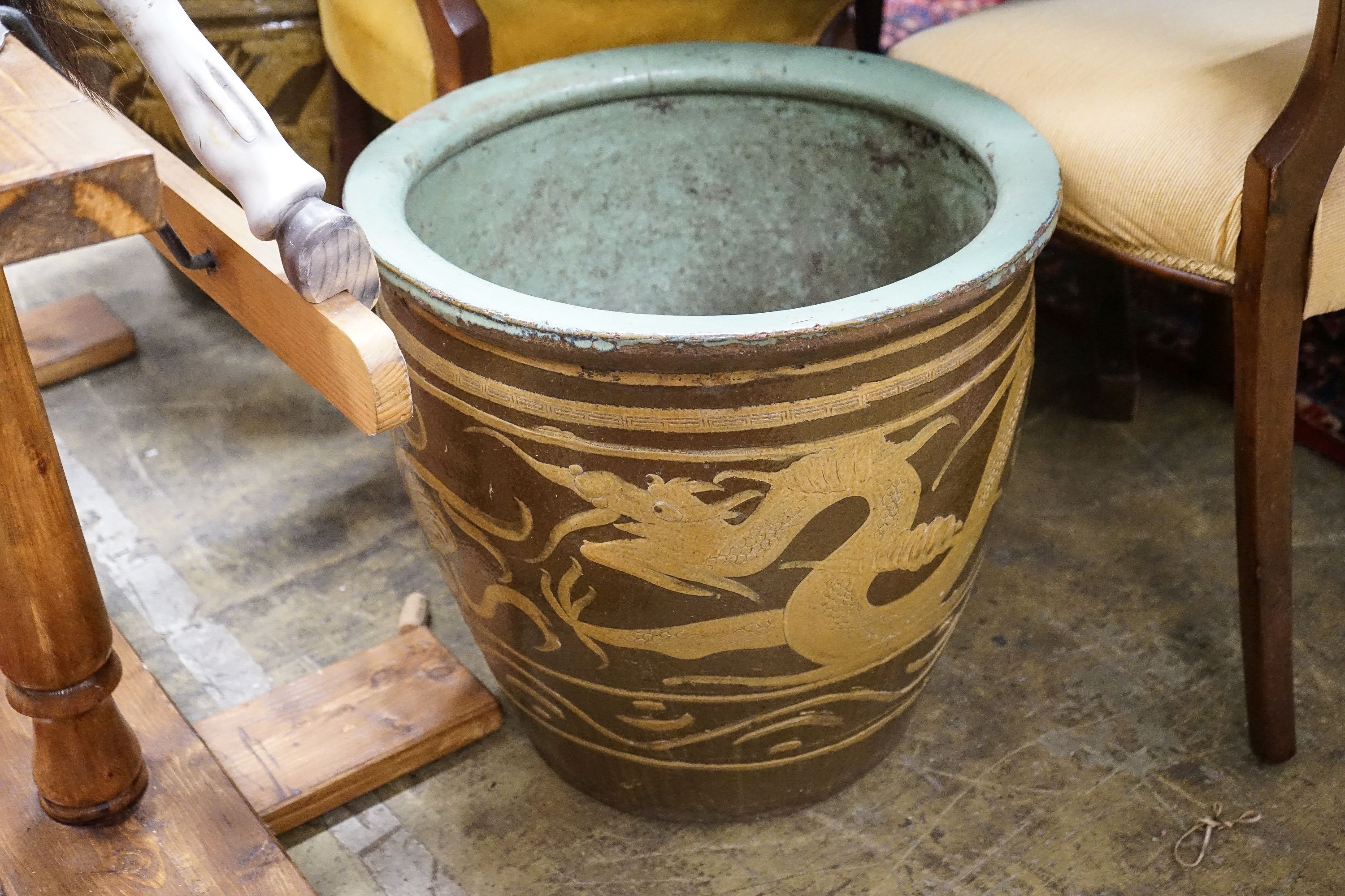 A pair of Chinese style circular glazed earthenware planters, diameter 50cm, height 47cm